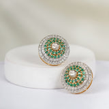 Luxurious Grandiose Diamond Polki Earrings with oval design, emeralds, and Polki diamonds.