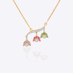 Spring in Bloom Pendant in 14k gold with upside-down tulip motifs