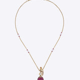 9K gold Mayur Noor Pendant featuring Polki diamonds and a pink gemstone drop, inspired by elegance and grace.