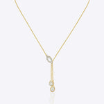 14kt gold lariat necklace featuring a central oval element and a vertical drop design for a graceful silhouette.