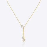 14kt gold lariat necklace featuring a central oval element and a vertical drop design for a graceful silhouette.