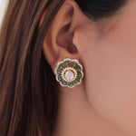 14K gold floral drop earrings set with Polki diamonds and emerald accents.
