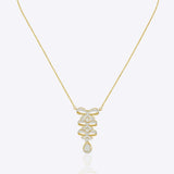 14K gold necklace with a playful tiered bow design and refined finish creating a modern and elegant statement.