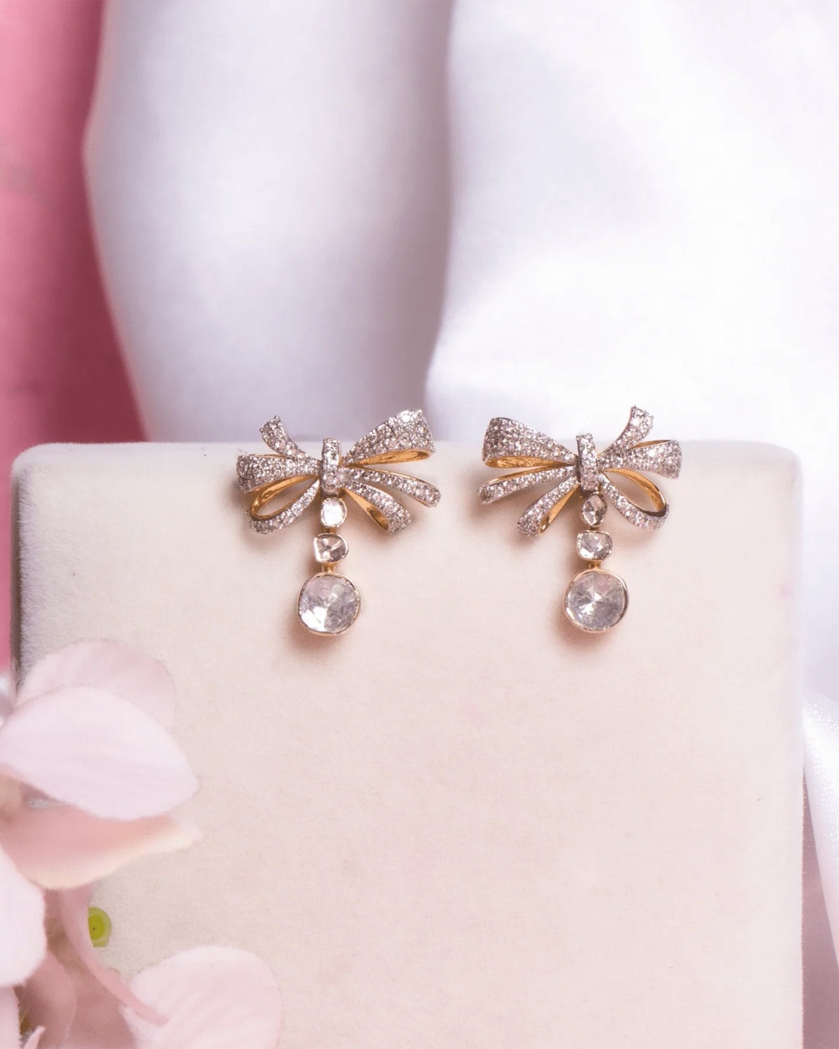 14kt gold bow-inspired drop earrings with delicate design