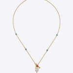 Serenade Pendant in 14k gold with a sculptural bird motif and Polki detailing