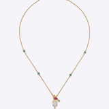 Serenade Pendant in 14k gold with a sculptural bird motif and Polki detailing