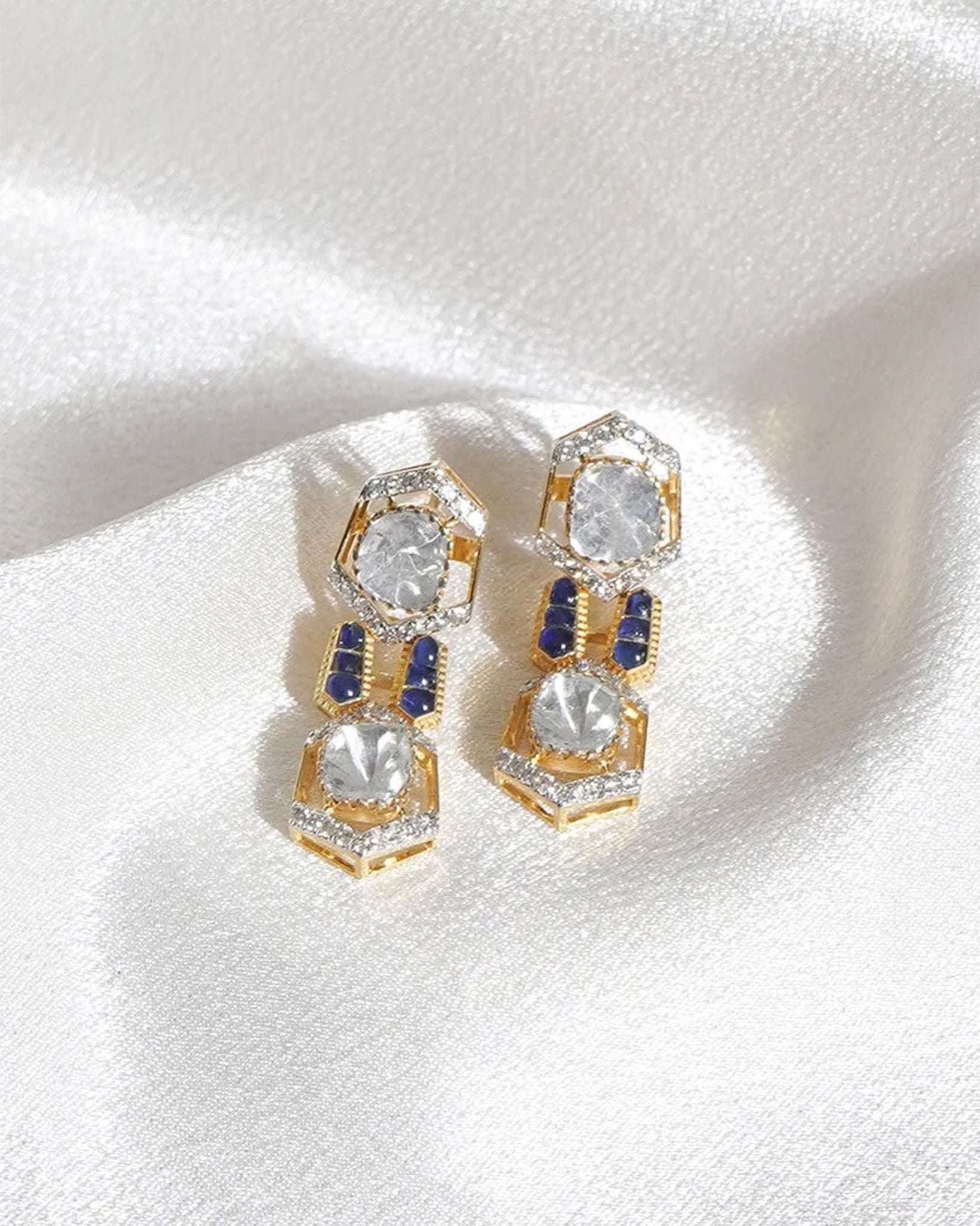 18K gold hexagonal earrings with Polki and vibrant talaf stone accents.
