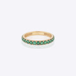 14K gold ring with radiant emeralds and diamond accents