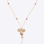 Gold necklace with a decorative pendant 