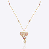 Gold necklace with a decorative pendant 