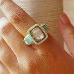 Gold ring with vibrant enamel detailing in a smooth, graceful band.