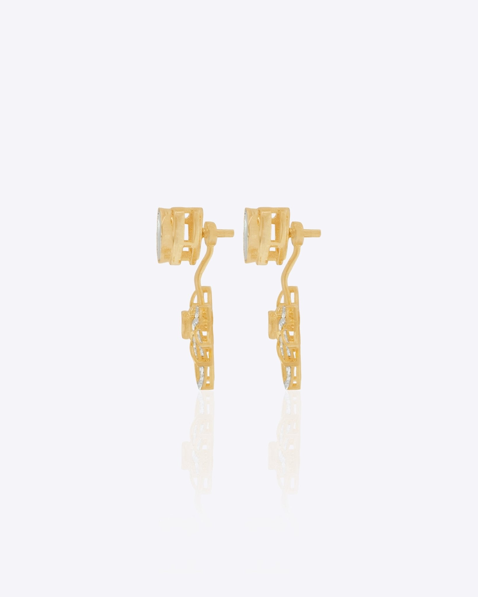 14K gold starburst-design jacket earrings set with Polki diamonds.