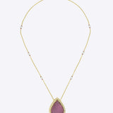 14K gold pendant with a pear-shaped pink tourmaline centerpiece.