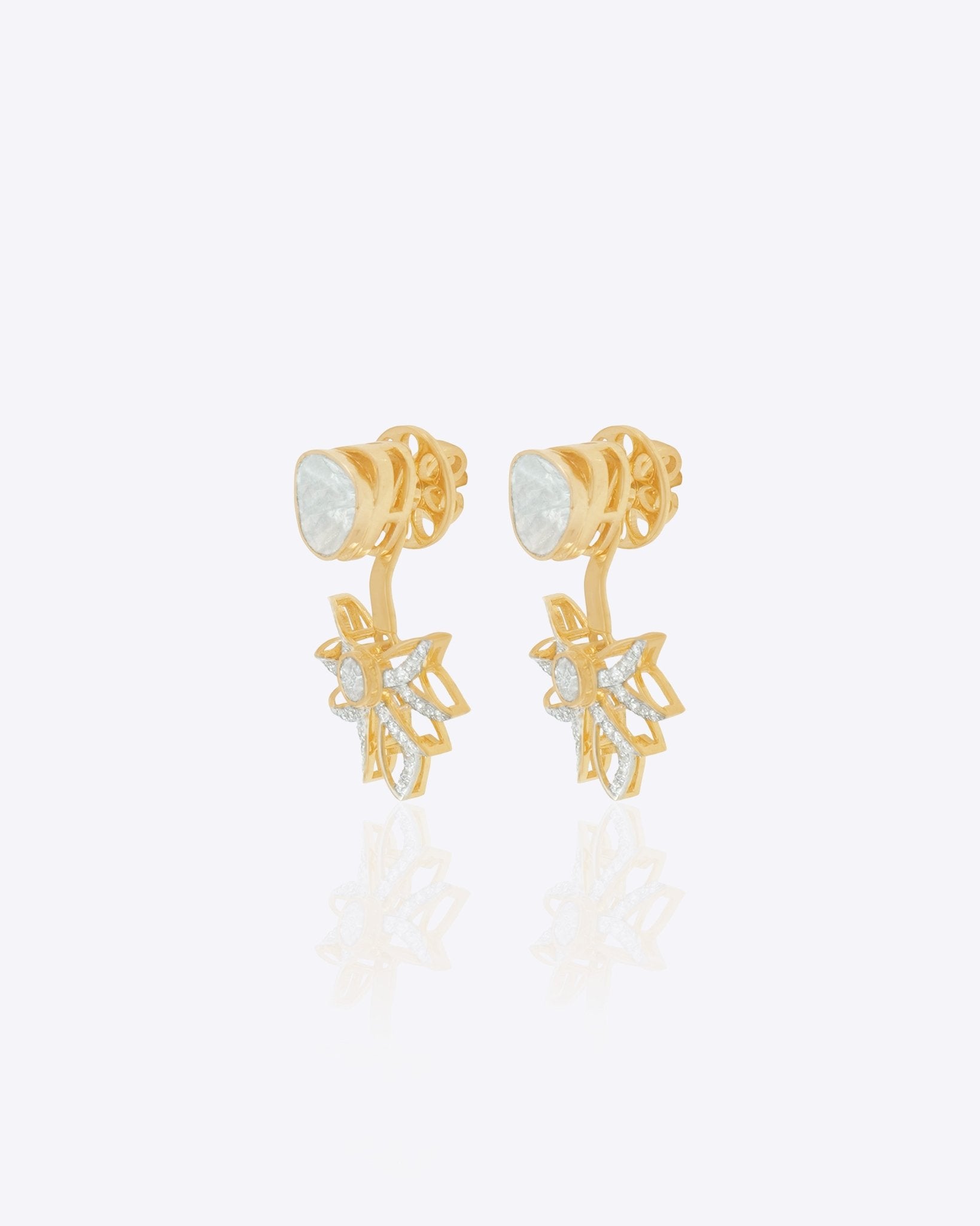 14K gold starburst-design jacket earrings set with Polki diamonds.