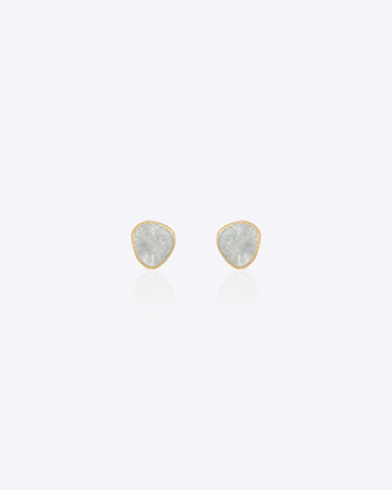 14K gold starburst-design jacket earrings set with Polki diamonds.