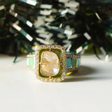 Gold ring with vibrant enamel detailing in a smooth, graceful band.