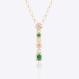 14k gold pendant with pink tourmaline, green aventurine, and Polki diamonds