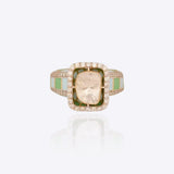 Gold ring with vibrant enamel detailing in a smooth, graceful band.