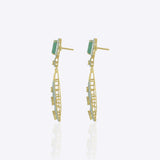 14K gold earrings with a geometric, fluid design