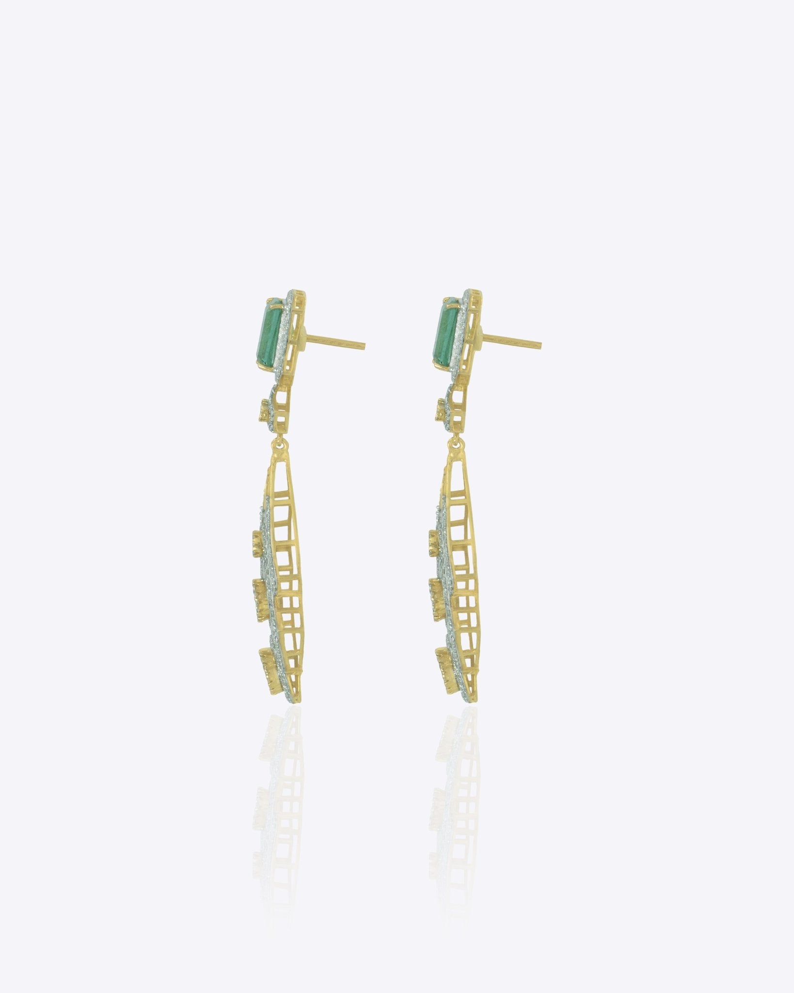 14K gold earrings with a geometric, fluid design
