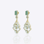 14K gold earrings with a geometric, fluid design