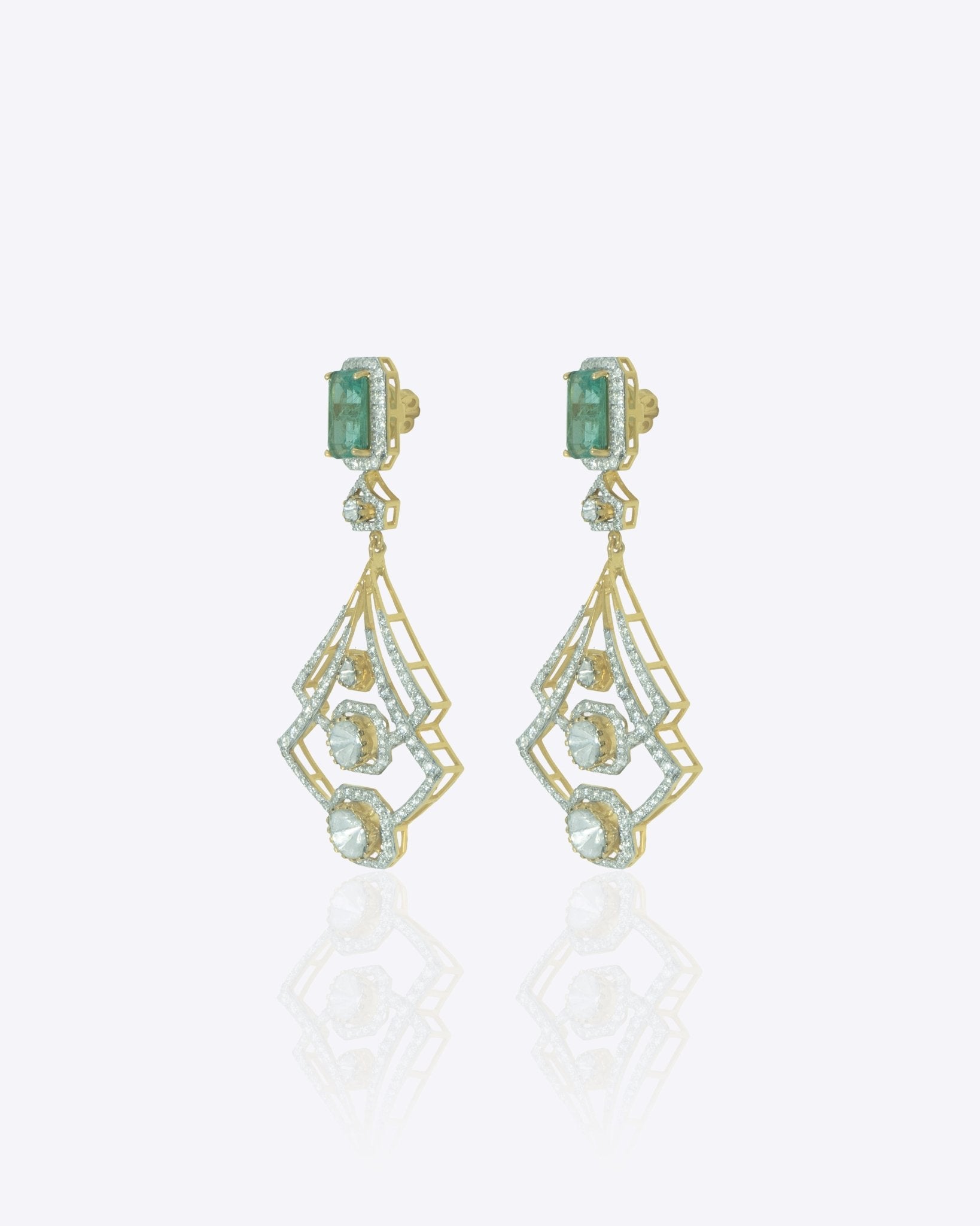 14K gold earrings with a geometric, fluid design