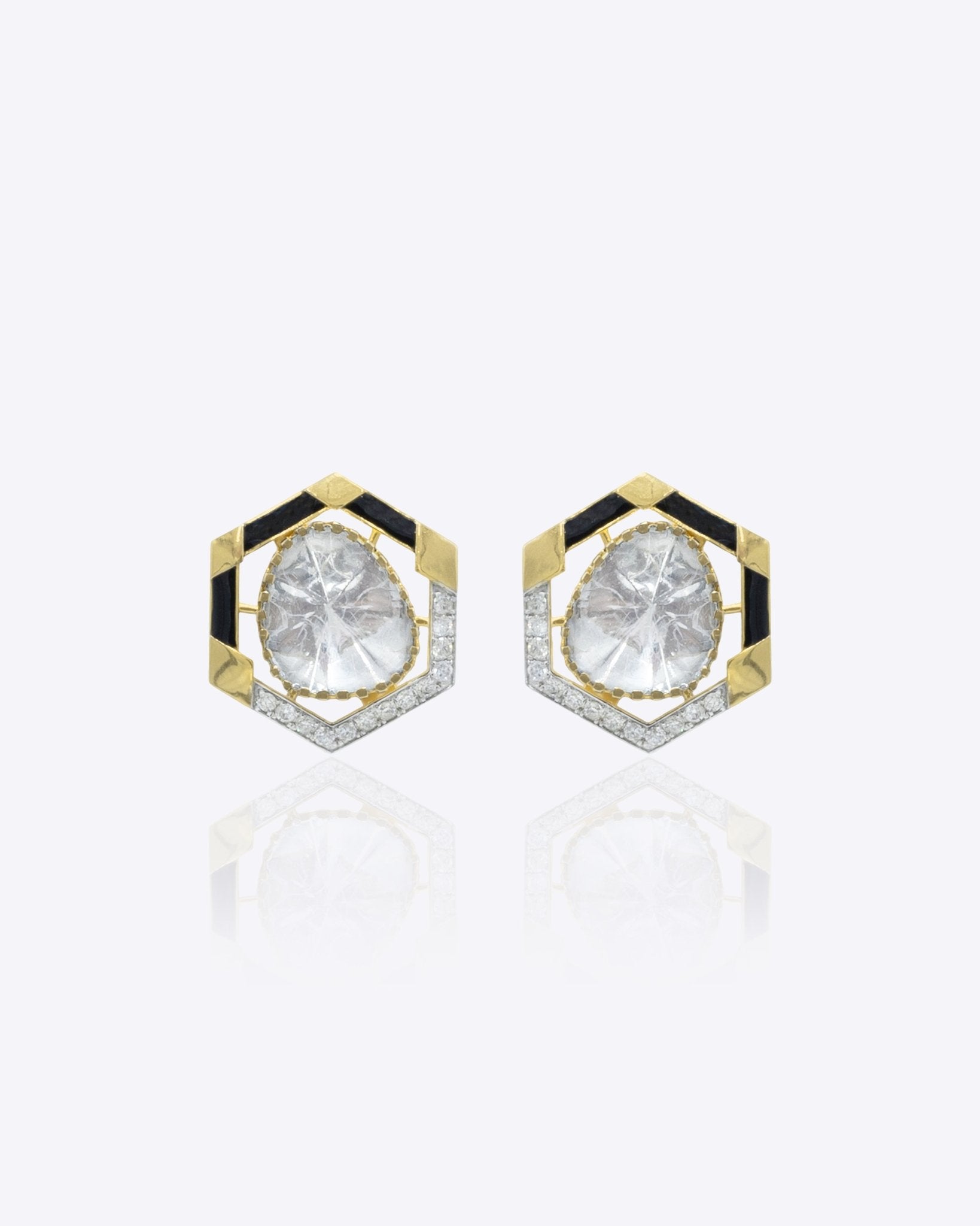Ringlet Polki Studs in 14K gold with an oval polki and gold halo