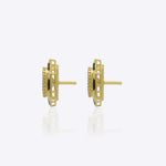 Ringlet Polki Studs in 14K gold with an oval polki and gold halo
