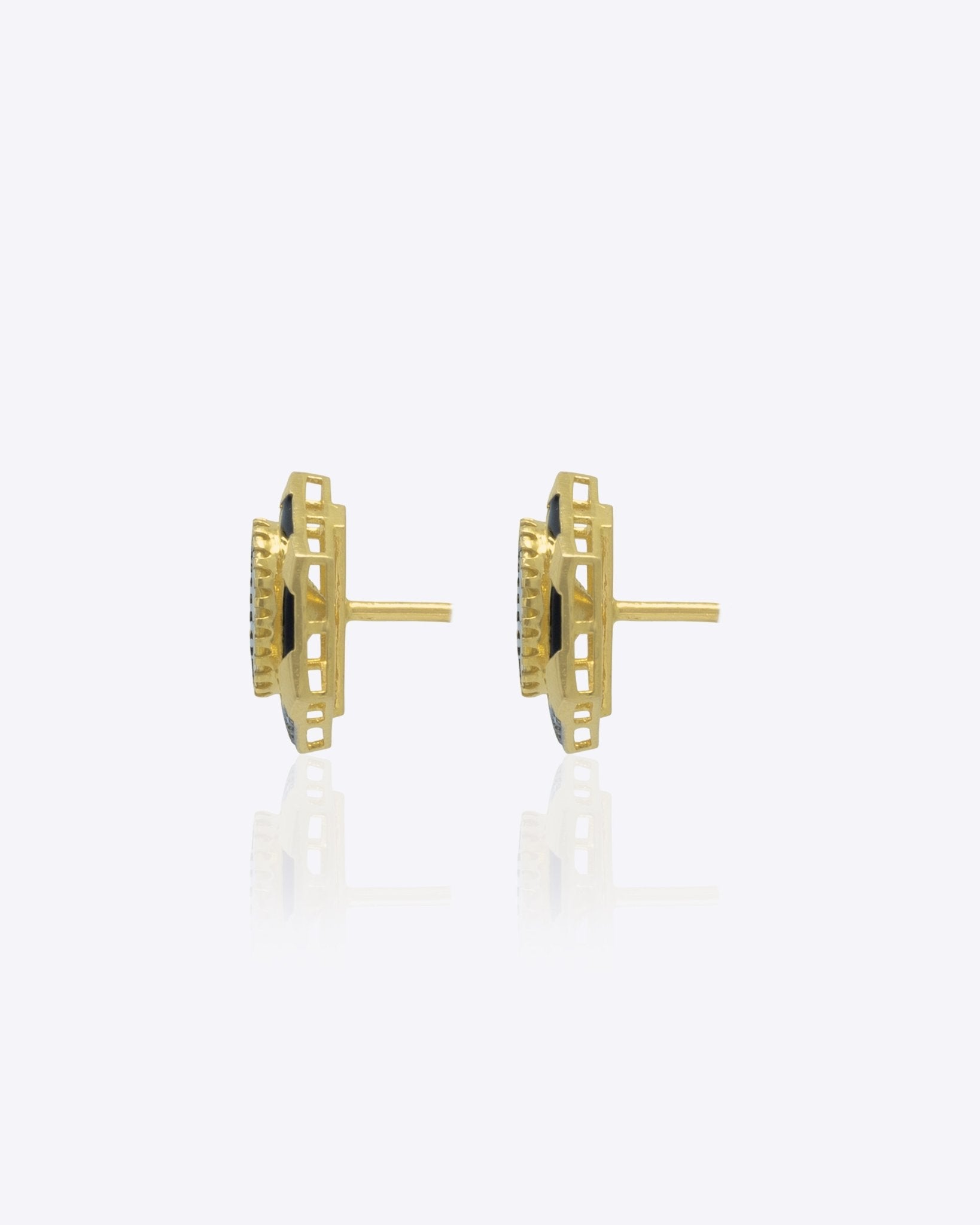 Ringlet Polki Studs in 14K gold with an oval polki and gold halo