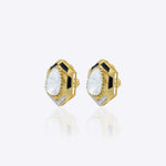 Ringlet Polki Studs in 14K gold with an oval polki and gold halo