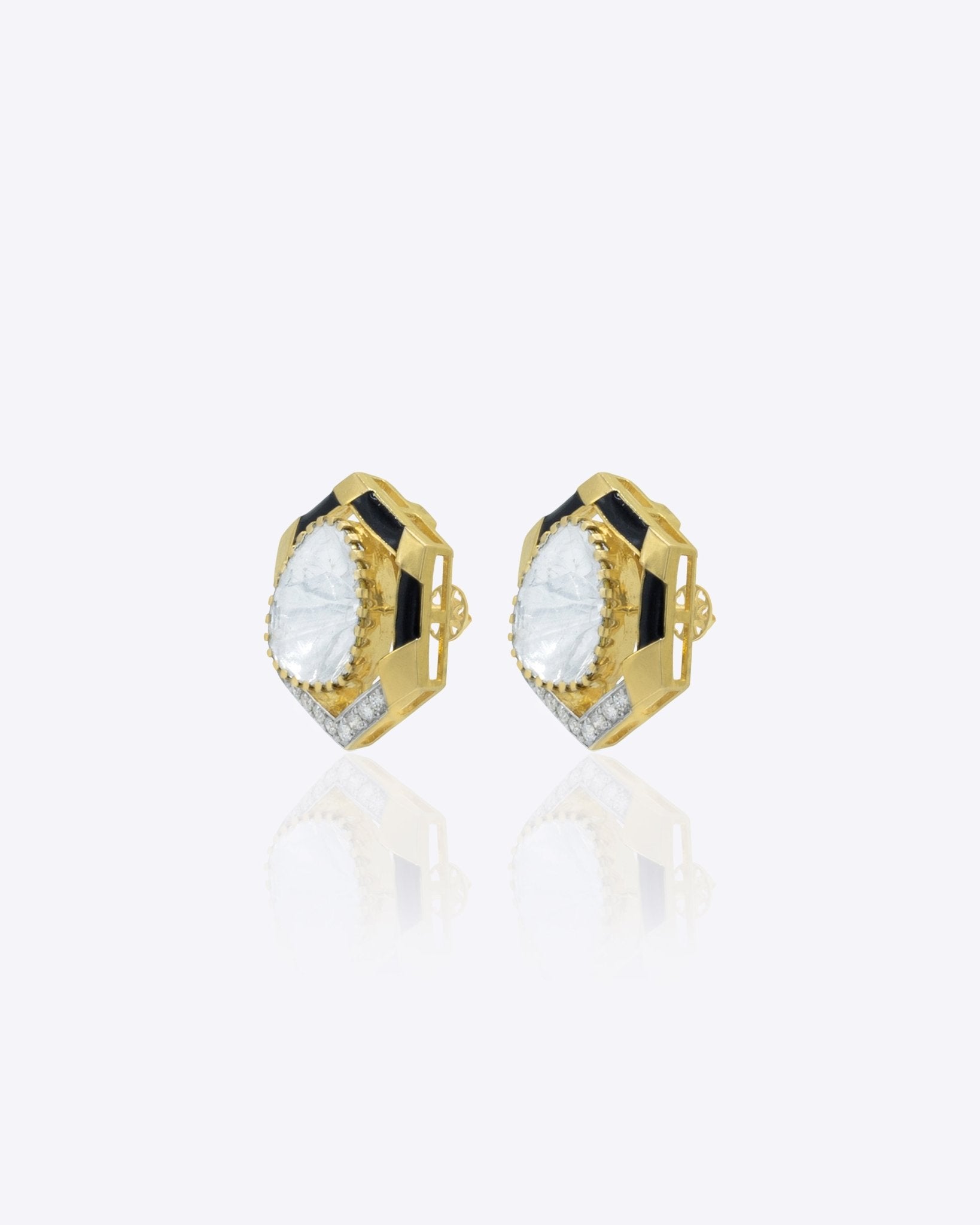 Ringlet Polki Studs in 14K gold with an oval polki and gold halo