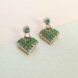 Drop earrings inspired by peacock with royal green color resembling wings.