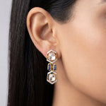 18K gold hexagonal earrings with Polki and vibrant talaf stone accents.