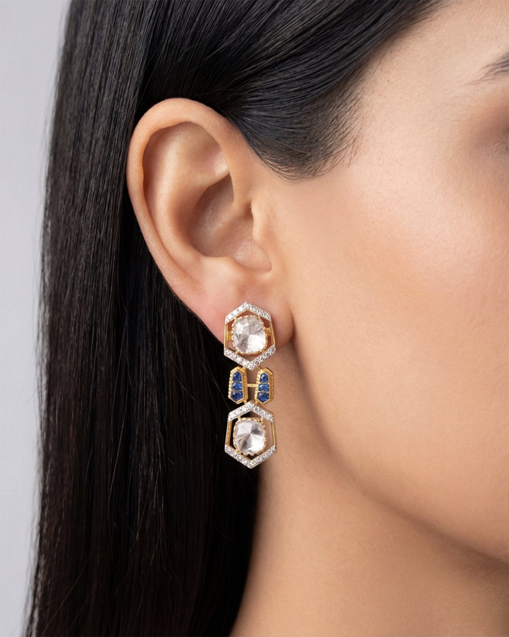 18K gold hexagonal earrings with Polki and vibrant talaf stone accents.