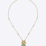 Sky Monarch Pendant in 14k gold with sculpted wings and an emerald-embellished chain