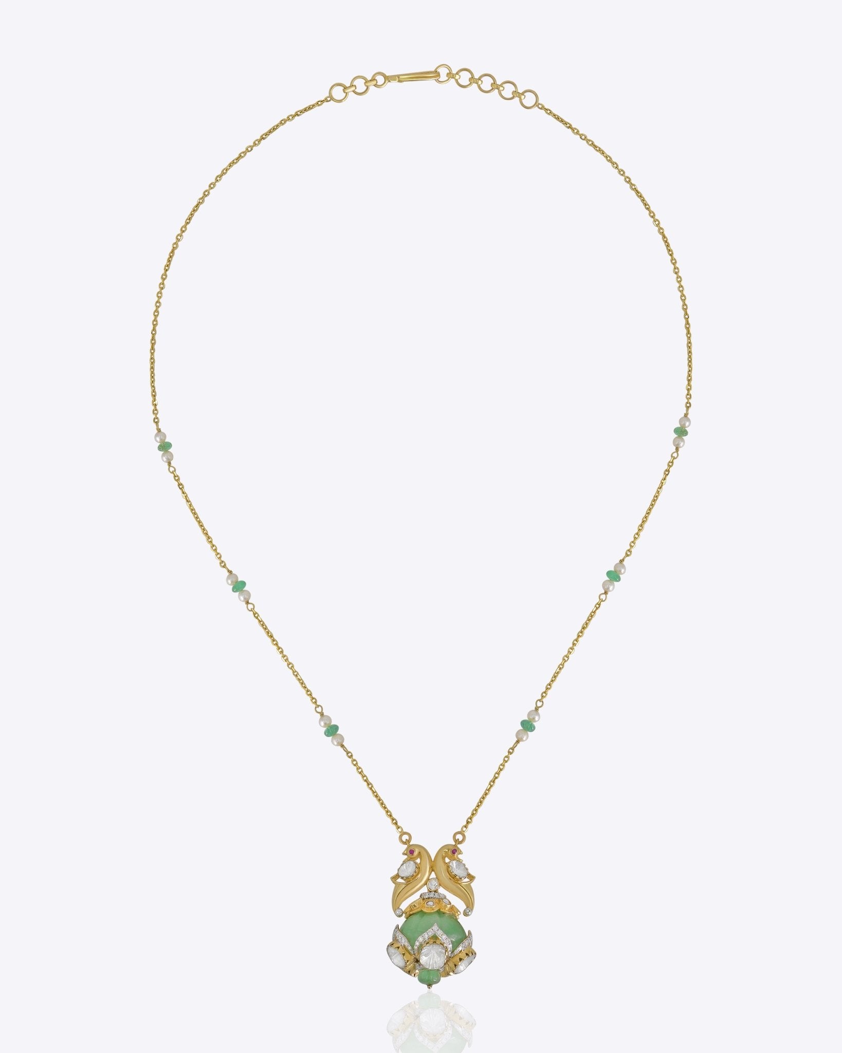 Sky Monarch Pendant in 14k gold with sculpted wings and an emerald-embellished chain
