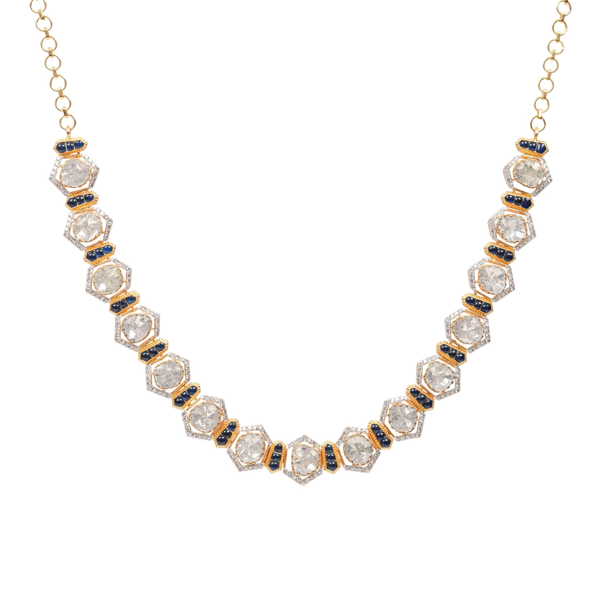 Maelstrom necklace on model, swirling in rich Polki artistry and gold elegance