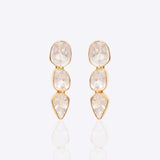14K gold minimal dangler earrings with three vertically linked Polki diamonds.