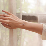 Veer Diamond Bracelet in 14K gold with Om motif and Polki diamond detailing.