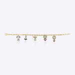 Whimsy in Bloom Bracelet in 18k gold with nature-inspired charm motifs.
