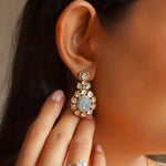 Statement Polki chandbalis captured in a tight model earshot, highlighting craftsmanship.