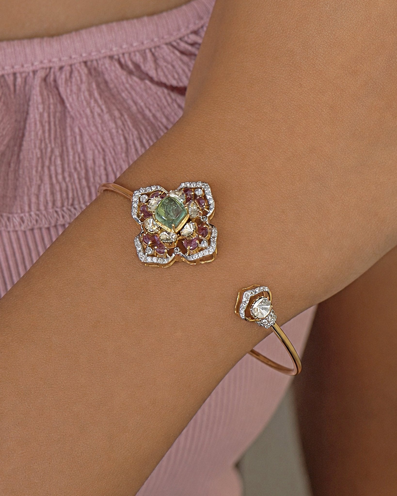 Rose Eclat Bangle in 14K gold with floral Polki motif and emerald-green centre stone