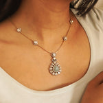 Aquamarine Petal Waters necklace gracing the model’s neckline, fused with polki diamonds