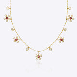 Floral Whisper Necklace in 14K gold with ruby-centred florals and Polki drops.