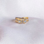 Radiant Bow Ring in 14K gold with a whimsical bow motif on interlocking bands