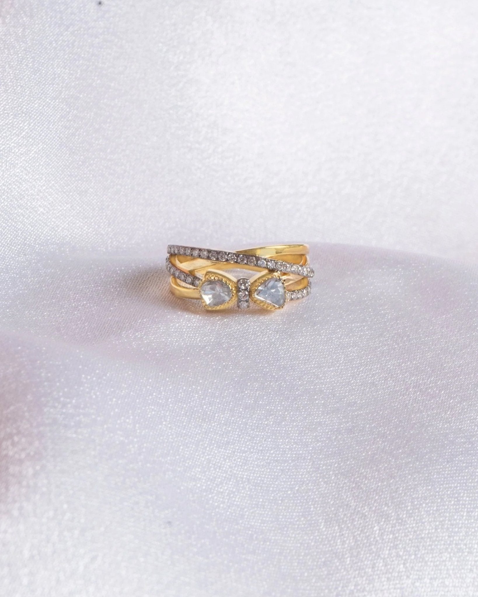 Radiant Bow Ring in 14K gold with a whimsical bow motif on interlocking bands