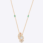 14k gold pendant with a delicate Polki peacock motif.
