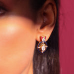 Radiant Polki diamond earrings in 18K gold with talaf stone framing.