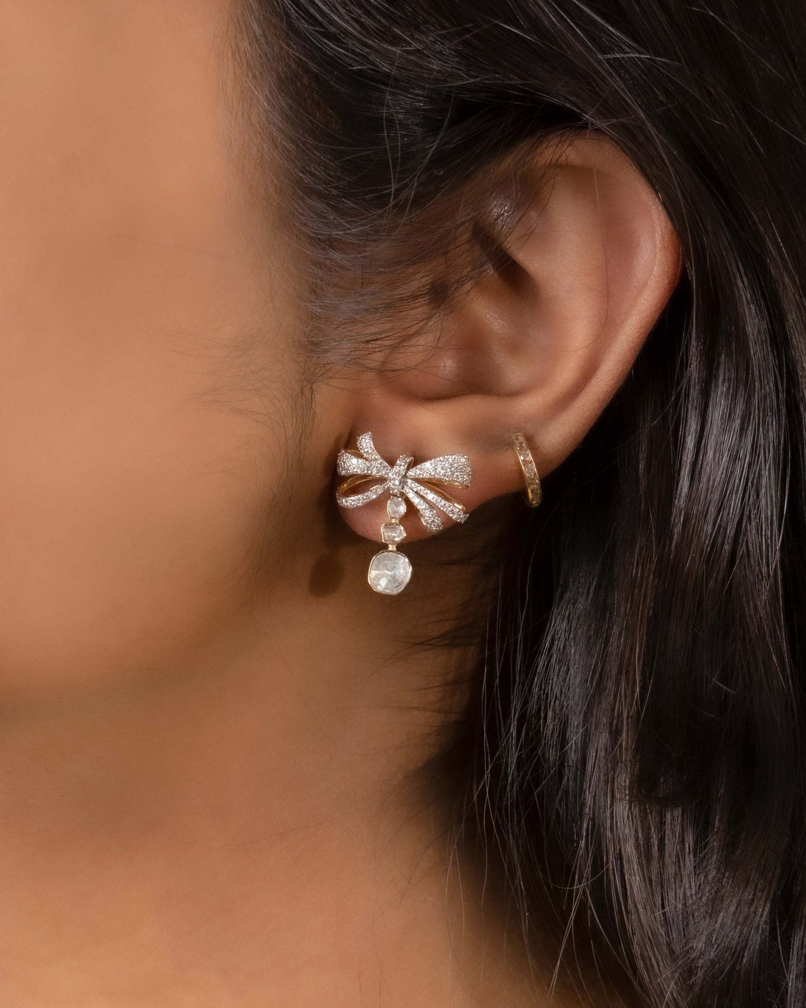 14kt gold bow-inspired drop earrings with delicate design