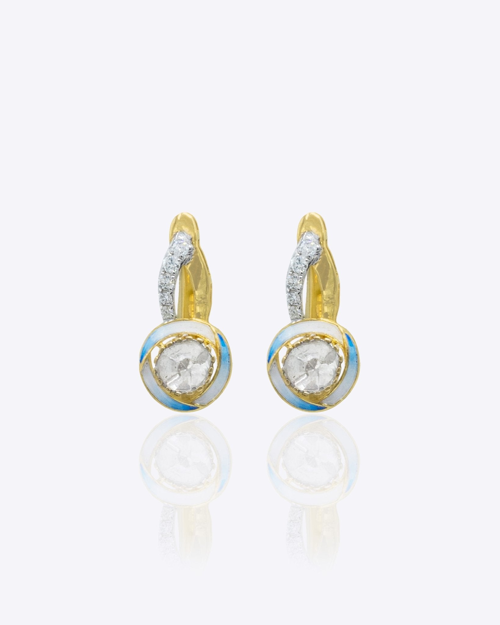 Seren Arc Earrings in 14K gold with a diamond and polished-gold curved design